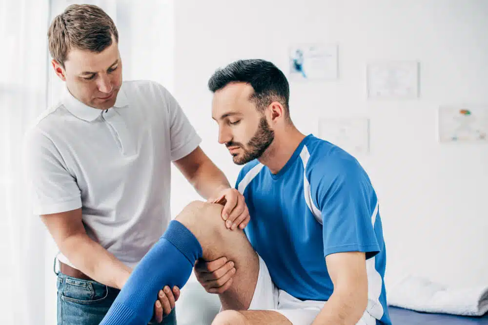 An athlete suffers from sports injury